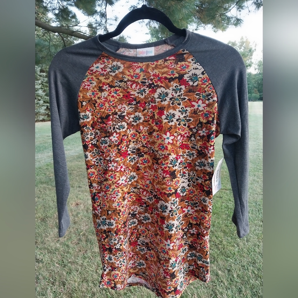 LulaRoe Randy XXS Shirt. 3/4 sleeves. Orange/Teal Flower front and back.